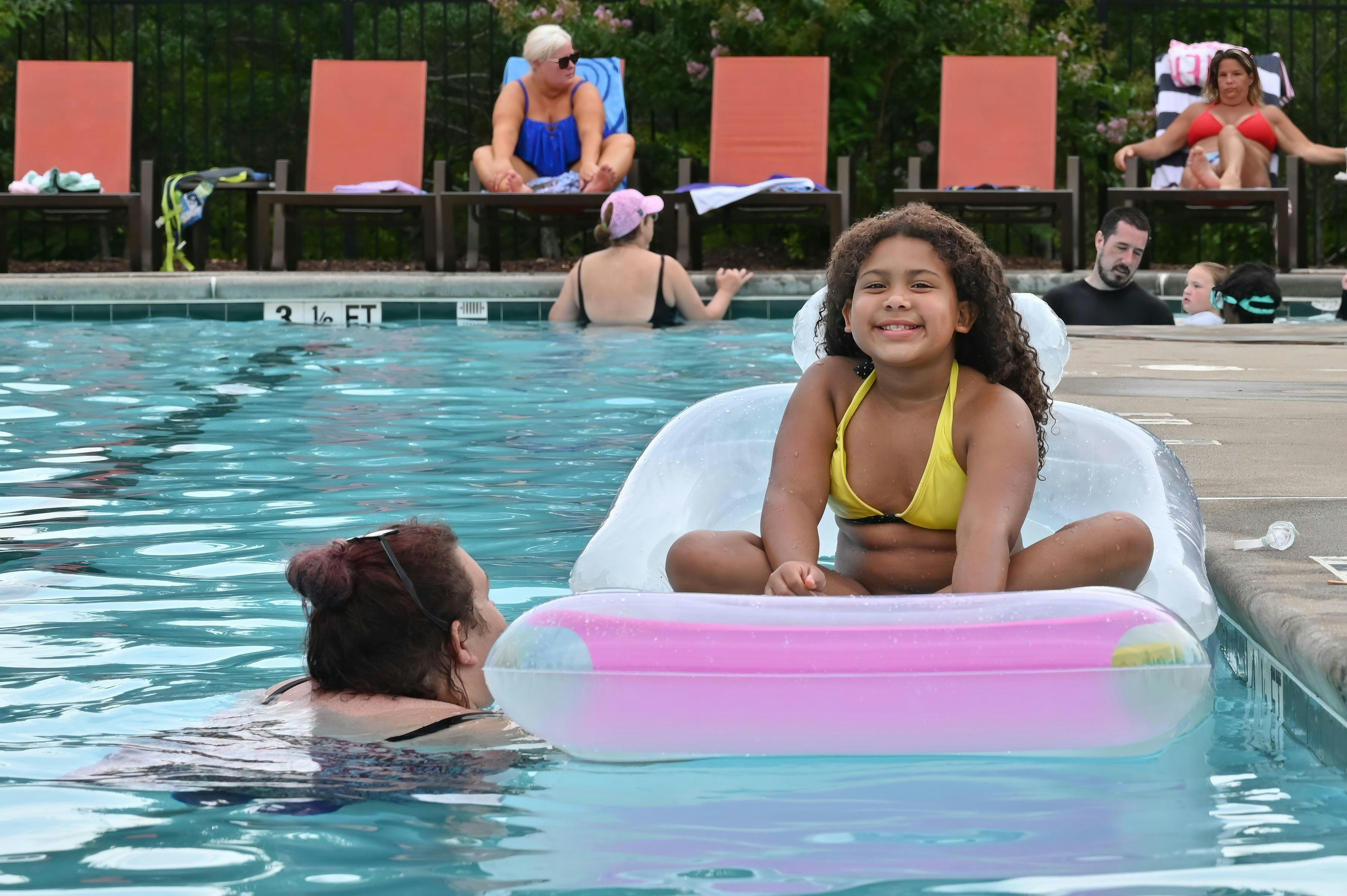 Residents Relaxing at Pool